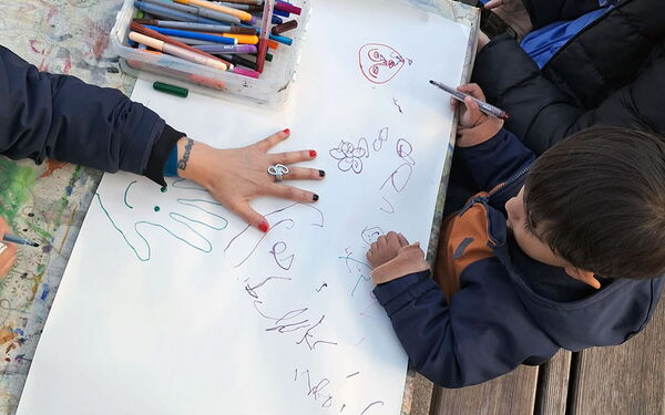 Beteiligung mit Stift und Papier